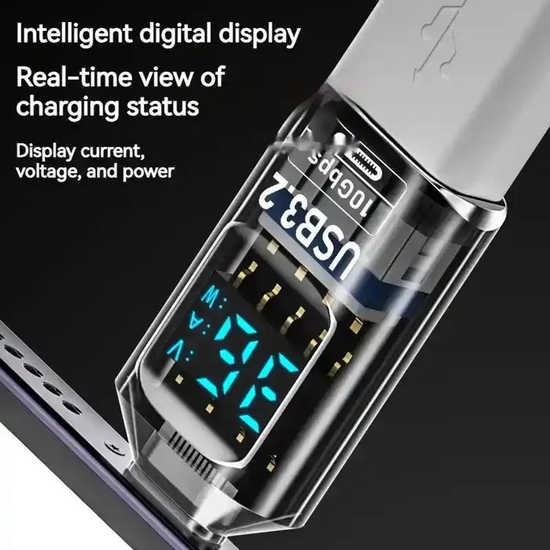 Close-up of USB 3.2 adaptor showing real-time digital display of voltage, current, and power during device charging.
