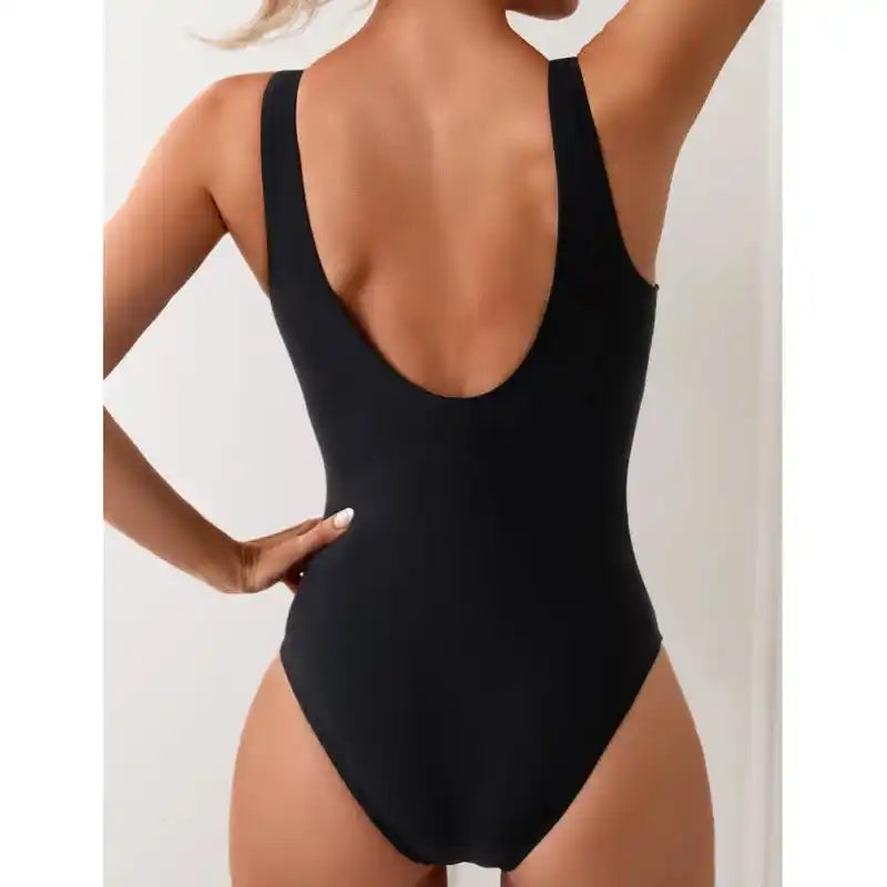 Back view of Striped Swimsuit | Push‑Up One‑Piece Closed Bodysuit 2025 in solid black, showcasing the closed bodysuit fit.