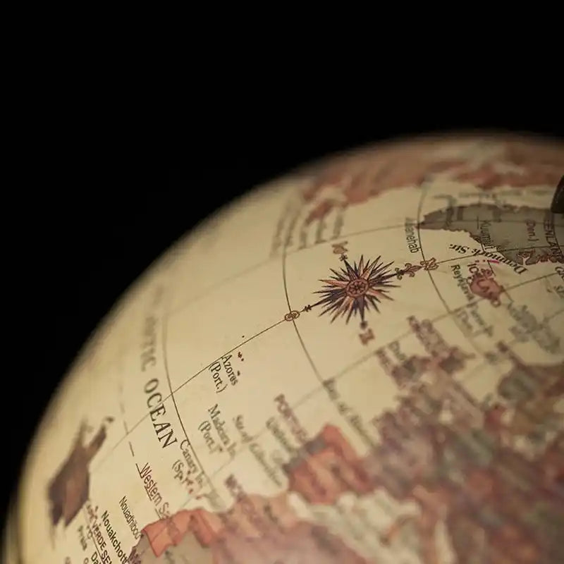 Close-up of a vintage-style globe with detailed world map