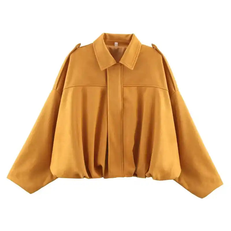 Mustard yellow suede oversize women’s bomber jacket with zip front and gathered hem, a vibrant coat for standout streetwear.