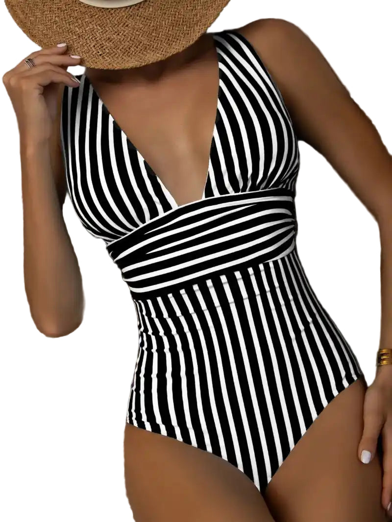Black and white striped V-neck vintage one-piece swimsuit with wrap waist detail. Classic retro swimwear in bold monochrome design.