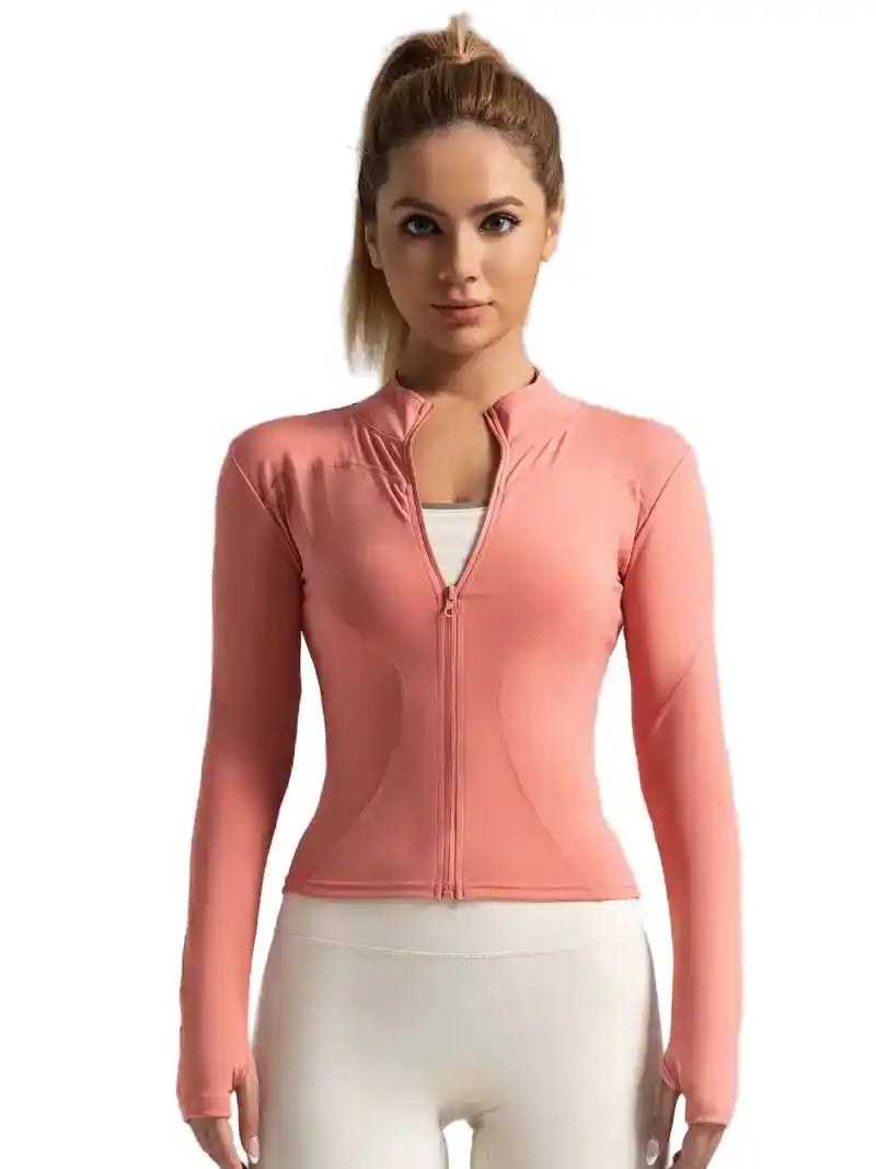 Peach pink women's long-sleeved yoga jacket with front zipper and athletic fit, designed for running and fitness sessions.
