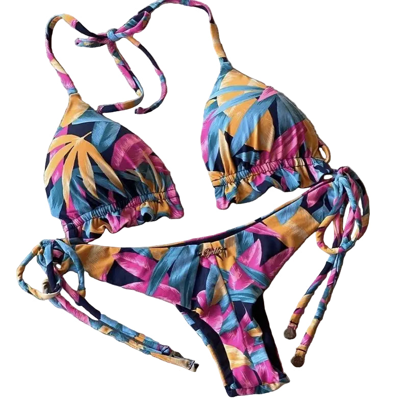 Colorful tropical leaf print push-up bikini set for women with adjustable side ties, ideal for vibrant summer swimwear collections.