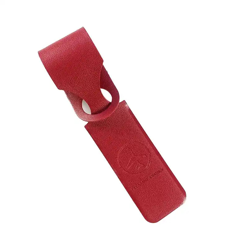 Red PU leather luggage tag with embossed logo and loop strap. Stylish suitcase identifier for travel and luggage organization.