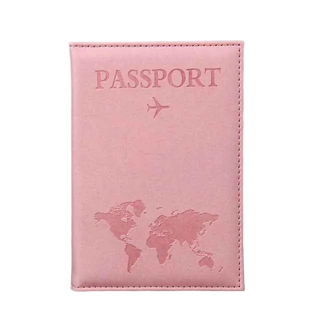 Pink passport holder with world map design on a gray background