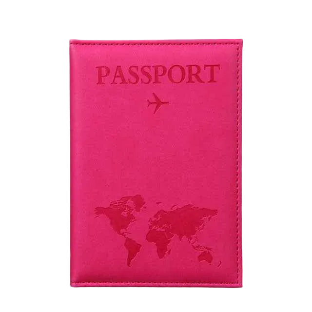 Pink passport holder with world map design on a gray background