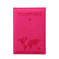 Pink passport holder with world map design on a gray background