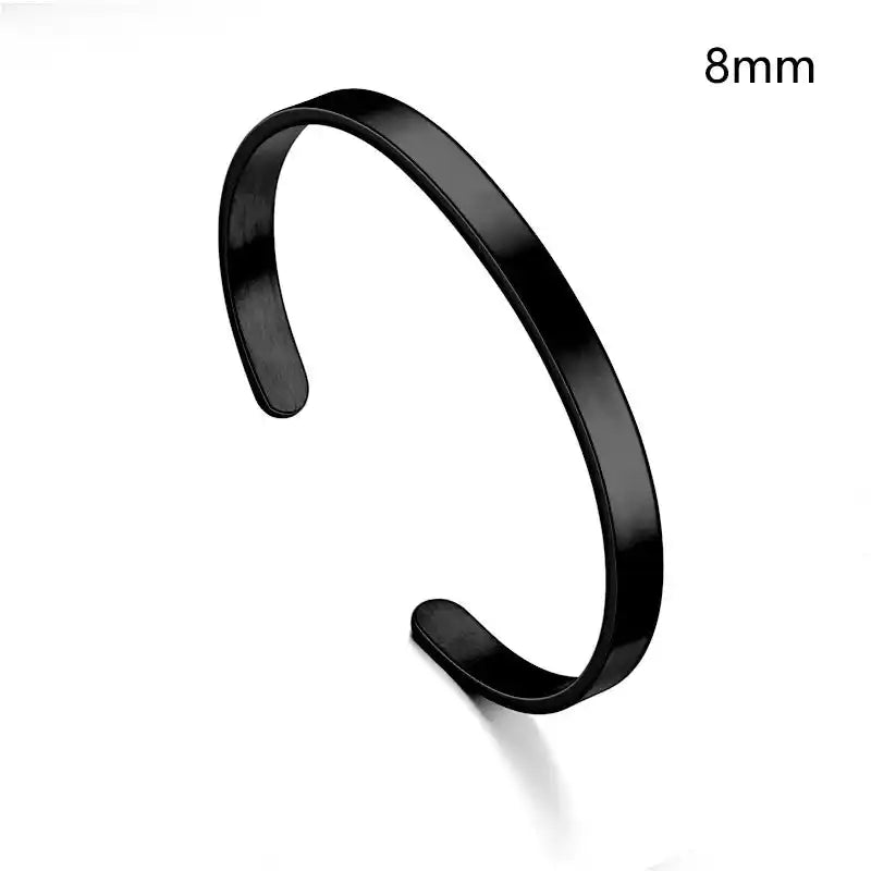 Matte black 8mm stainless steel cuff bracelet. Custom engraved personalised bracelet with bold, wide band design.