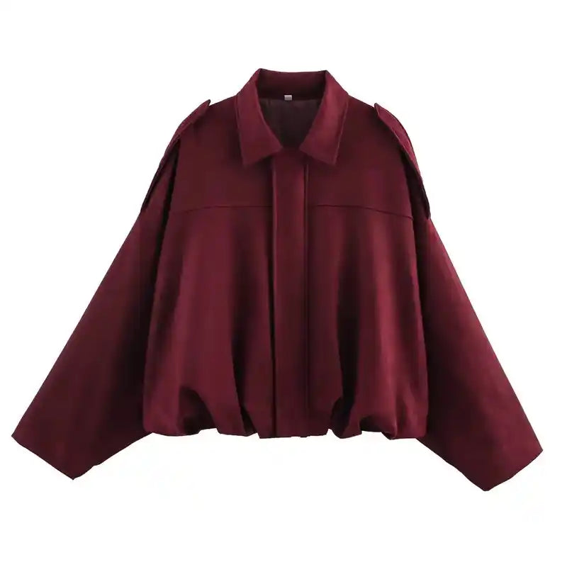 Wine red suede oversize women’s bomber jacket with zip front and relaxed fit, a bold outerwear choice for stylish layering.