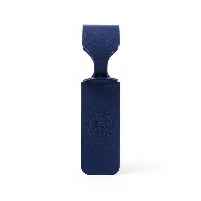 Navy blue PU leather luggage tag with globe logo and secure strap. Travel accessory with ID/address holder for suitcases.